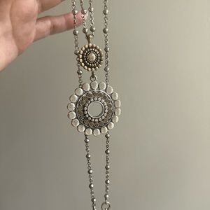 Long silver medallion necklace